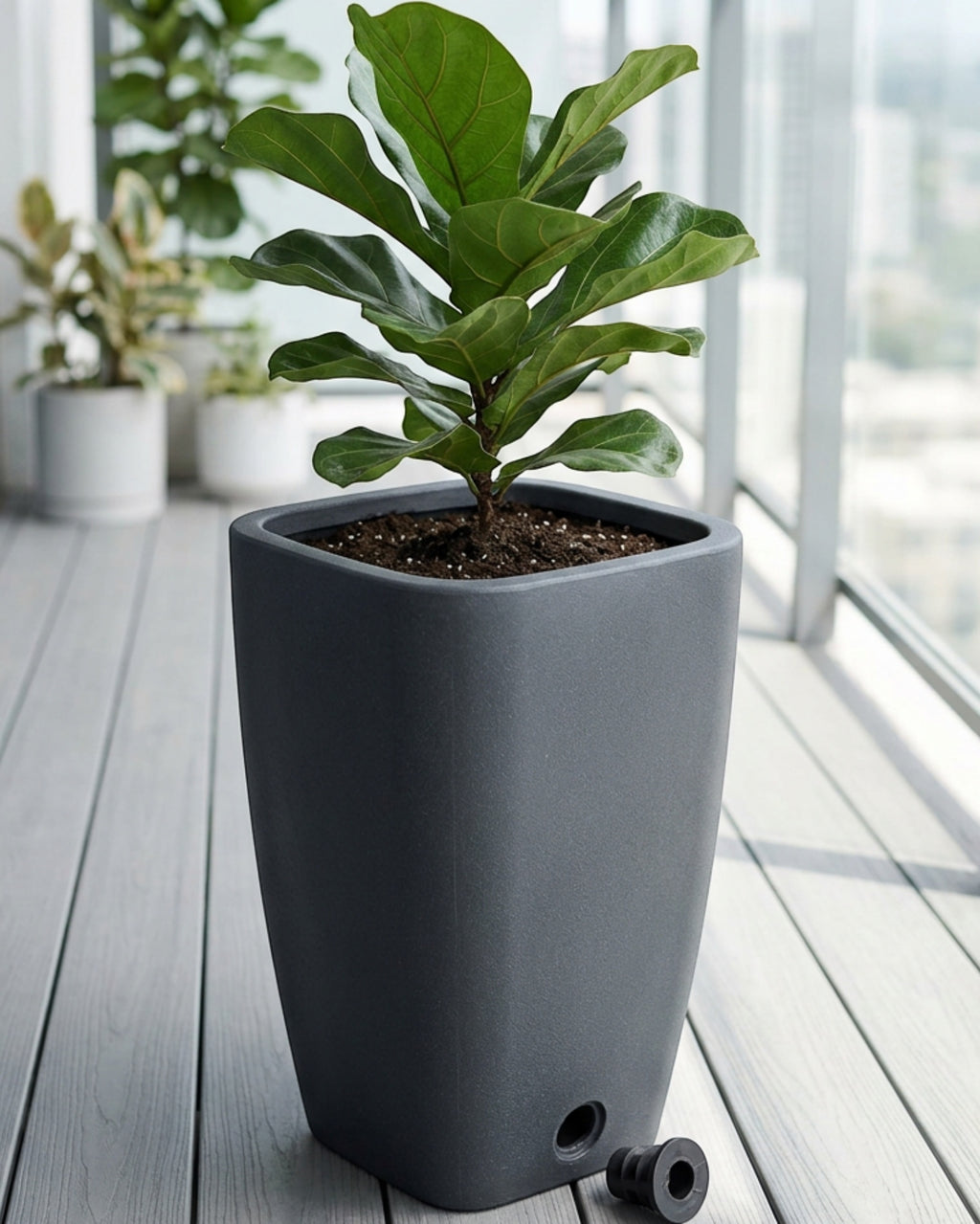 Ybdwn Tall Tapered Resin Planter 16 in Charcoal - Lifestyle view