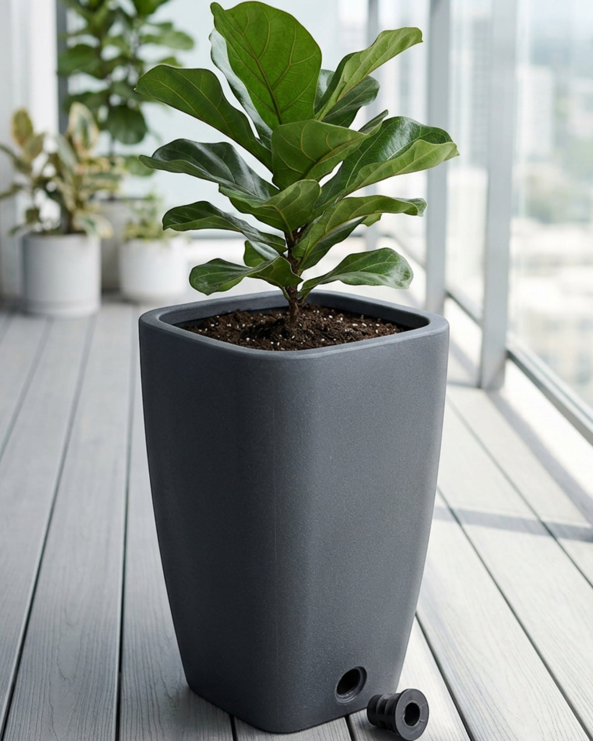 Ybdwn Tall Tapered Resin Planter 16 in Charcoal - Lifestyle view